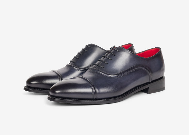 Oxford color navy con puntale