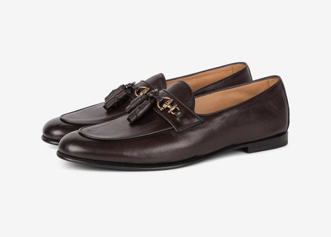 Loafer with golden horsebit and tassels